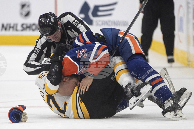 APTOPIX Bruins Oilers Hockey