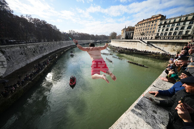 APTOPIX Italy New Year's Dive