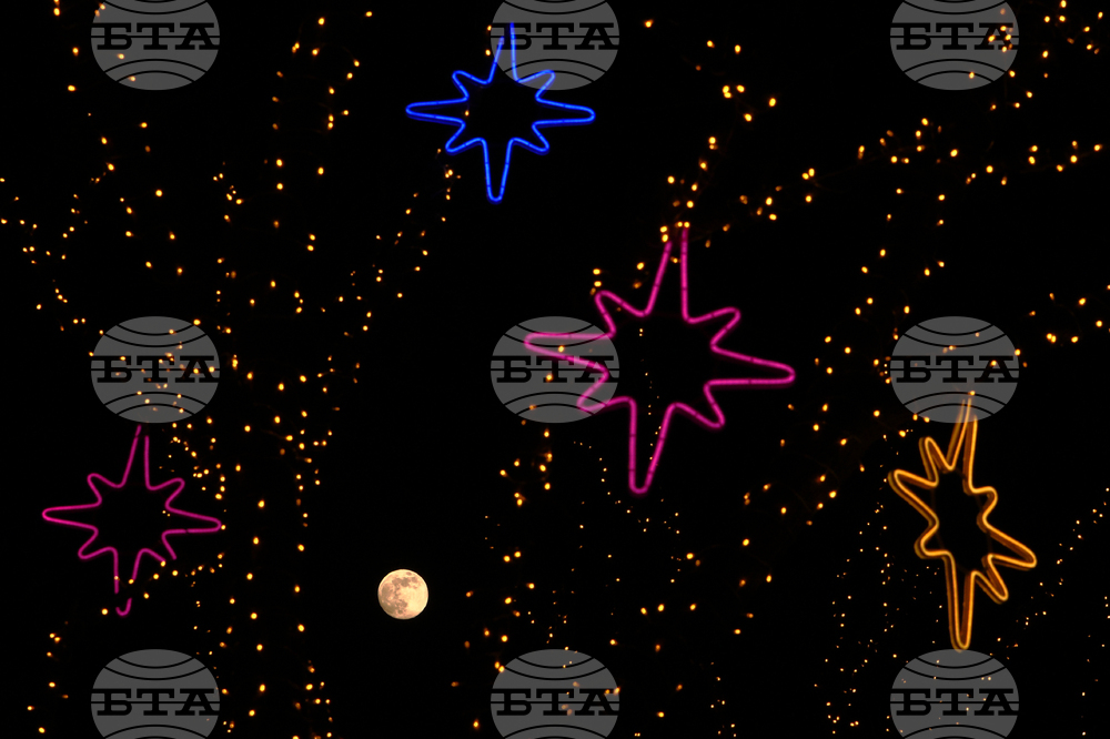 APTOPIX China Wolf Supermoon