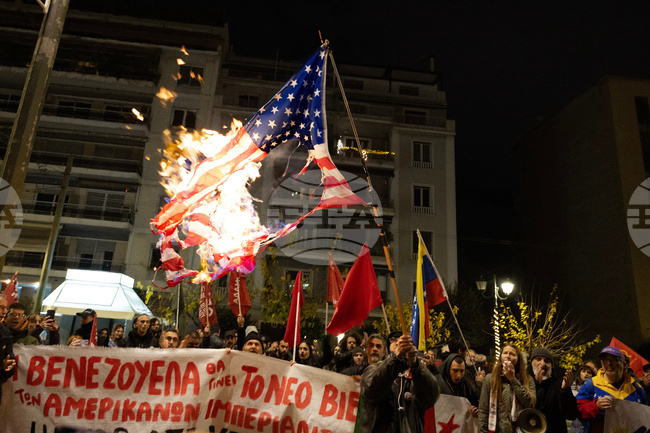 APTOPIX Greece US Venezuela Protest