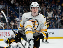 APTOPIX Bruins Canucks Hockey