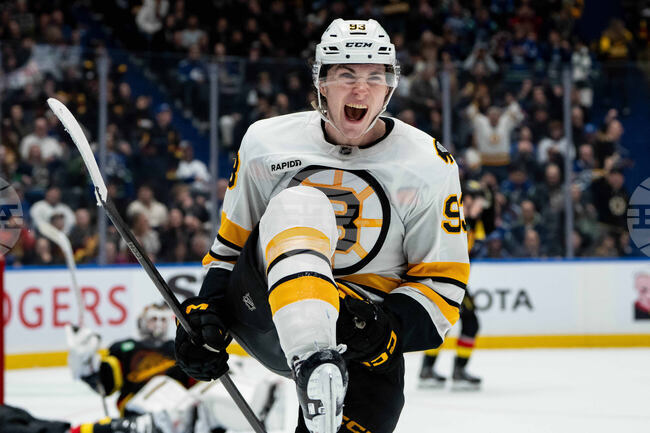 APTOPIX Bruins Canucks Hockey