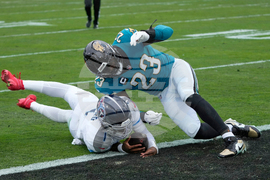 APTOPIX Titans Jaguars Football