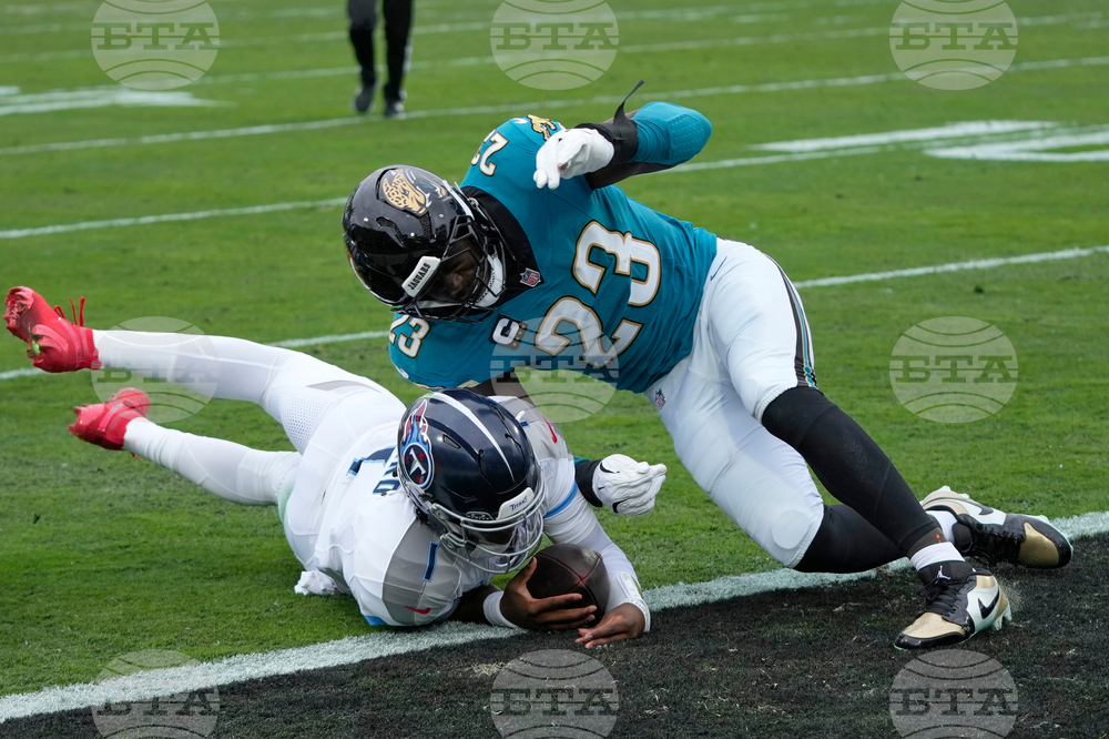 APTOPIX Titans Jaguars Football