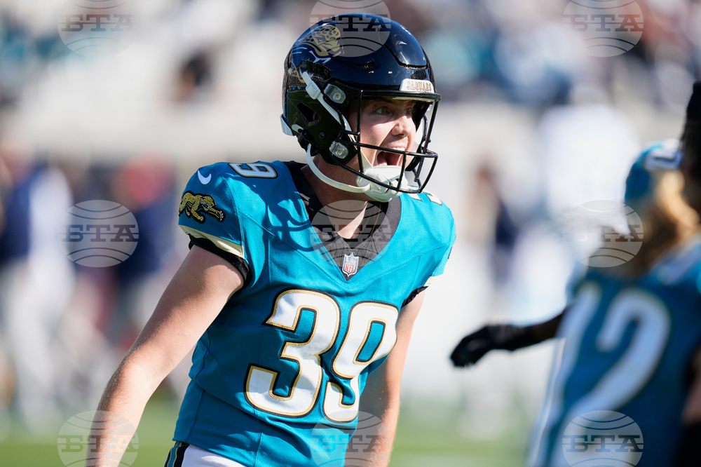 APTOPIX Titans Jaguars Football