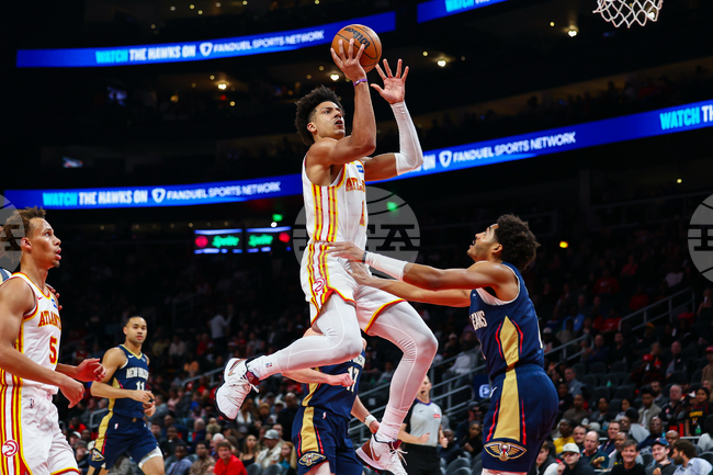 Pelicans Hawks Basketball