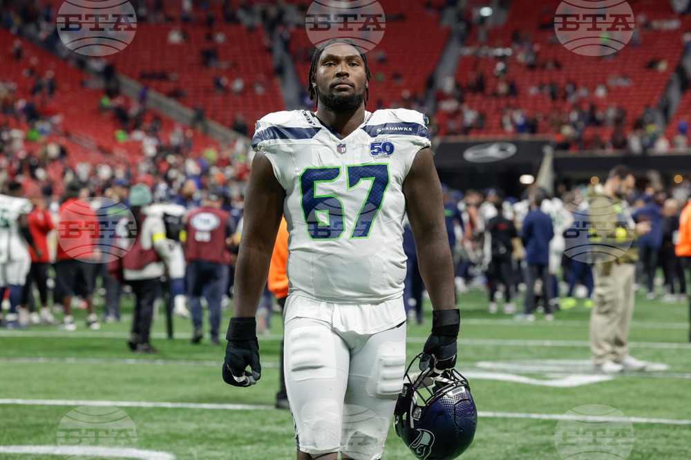 Seahawks Cross Football