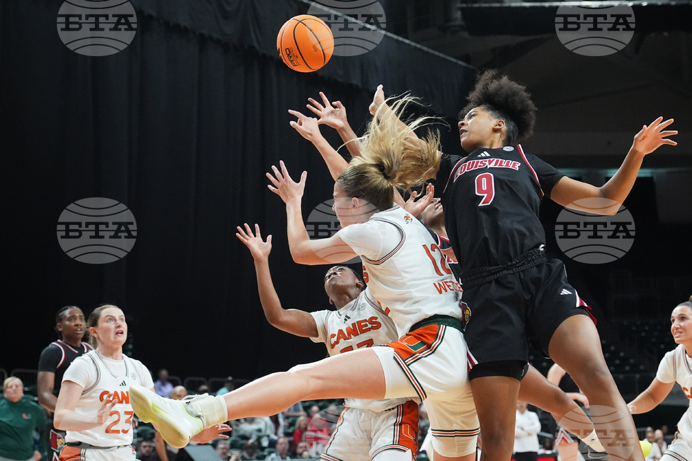 APTOPIX Louisville Miami Basketball