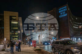 Activists Project Message Condemning ICE After Killing of Minneapolis Woman