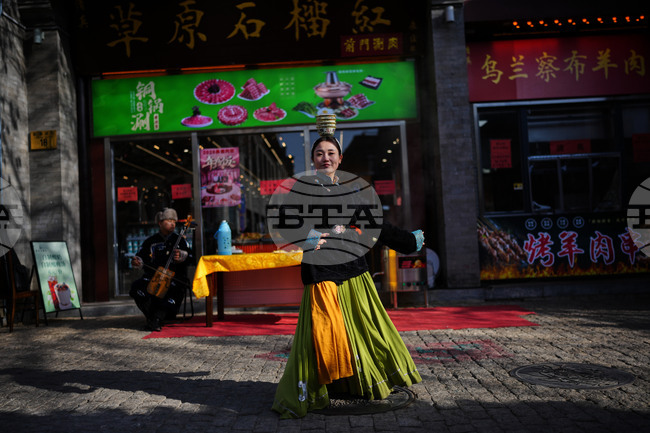 APTOPIX China Daily Life