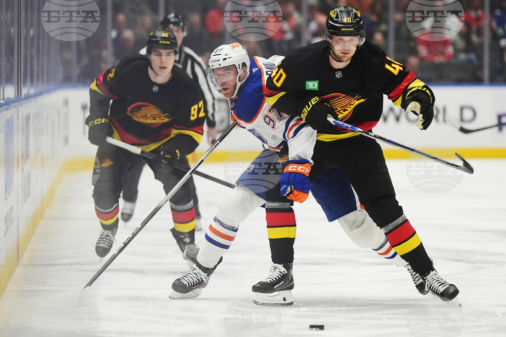 Oilers Canucks Hockey