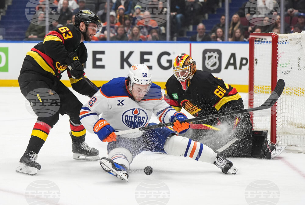 Oilers Canucks Hockey