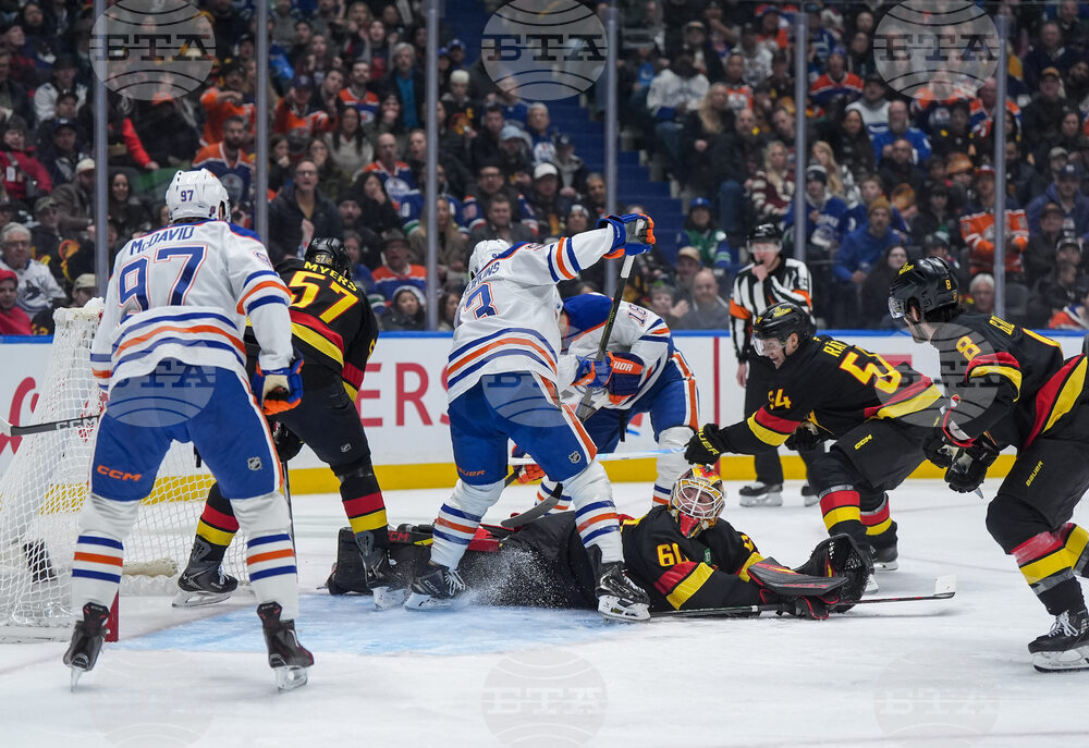 Oilers Canucks Hockey