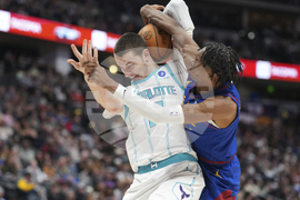 APTOPIX Hornets Nuggets Basketball