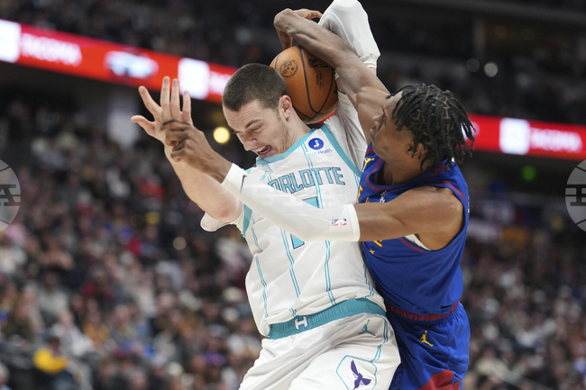 APTOPIX Hornets Nuggets Basketball