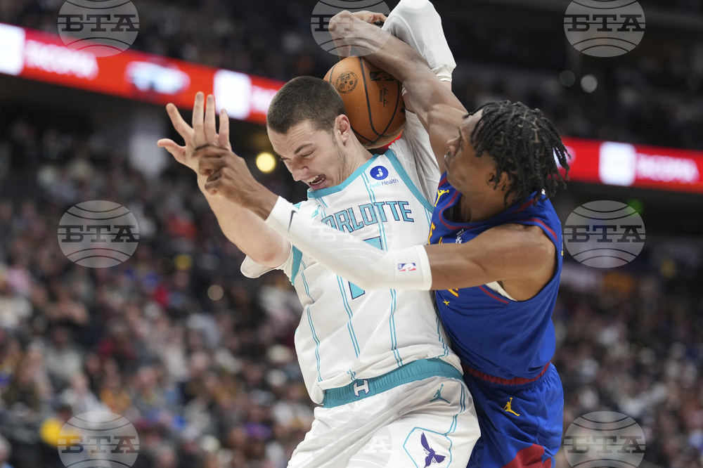 APTOPIX Hornets Nuggets Basketball