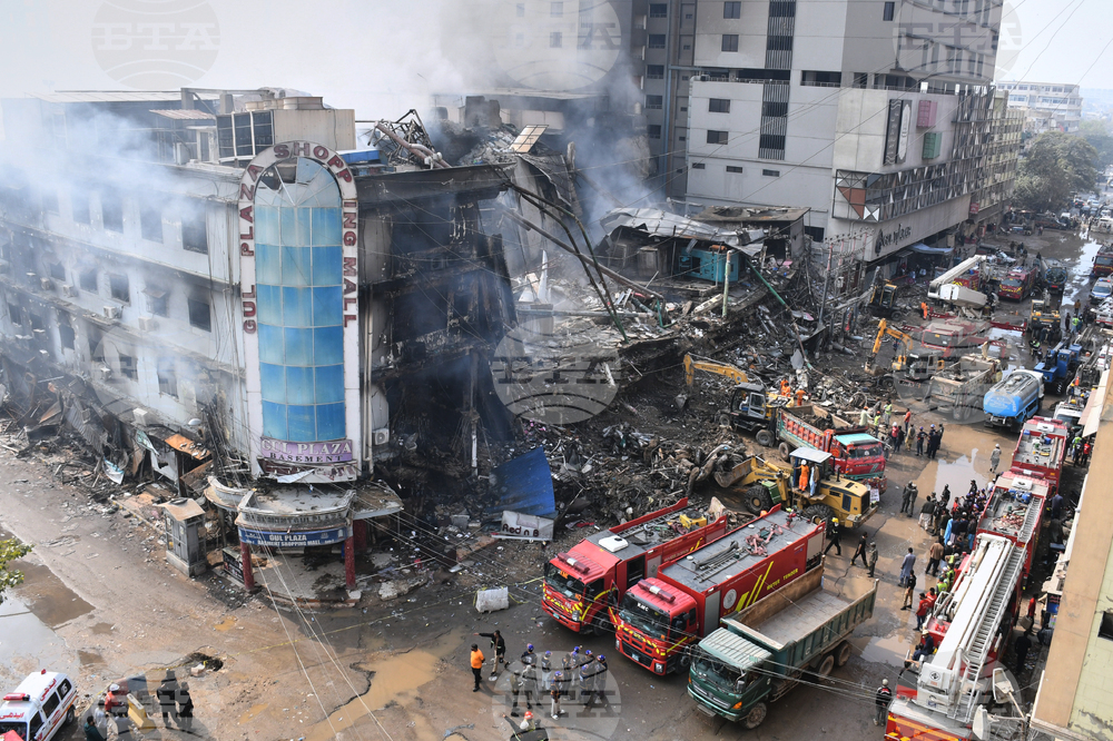 APTOPIX Pakistan Shopping Plaza Fire
