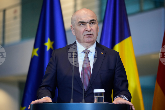 За разлика от България Румъния не изпълнява критериите за влизане в еврозоната, заяви в Берлин премиерът Илие Боложан