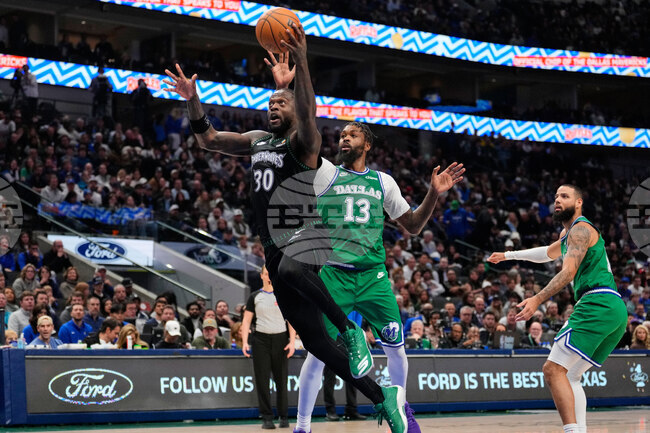 APTOPIX Timberwolves Mavericks Basketball