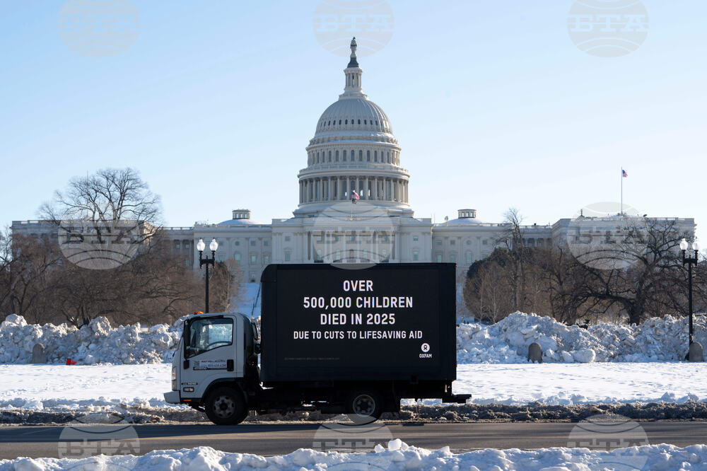 Oxfam mobile billboard in DC marks one year of President Trump's humanitarian aid and USAID cuts