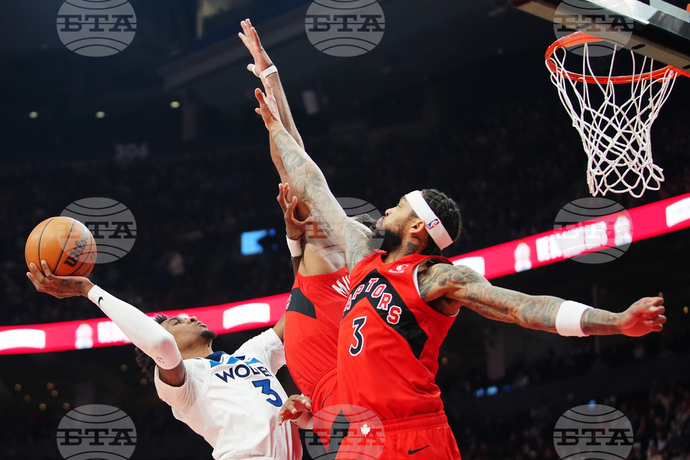 Timberwolves Raptors Basketball