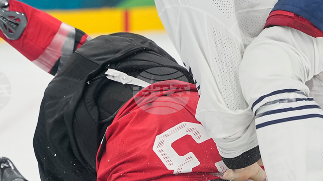 Френският хокеист Пиер Кринон бе призован от федерацията на страната си след боя с канадеца Томас Уилсън