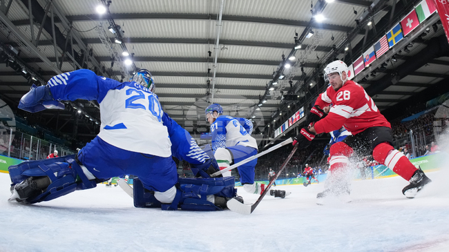 Швейцария и Германия се класираха за четвъртфиналите на олимпийския турнир по хокей на лед