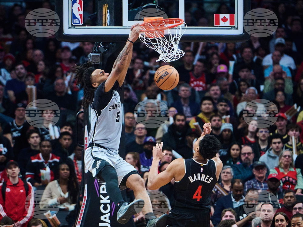 Spurs Raptors Basketball