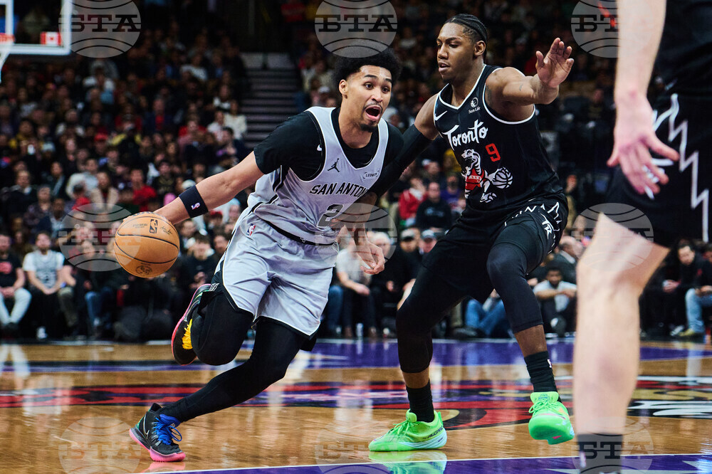 Spurs Raptors Basketball