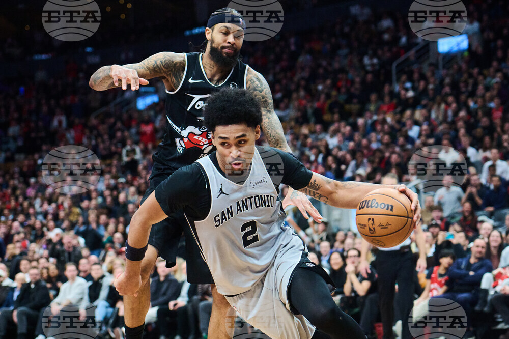 Spurs Raptors Basketball