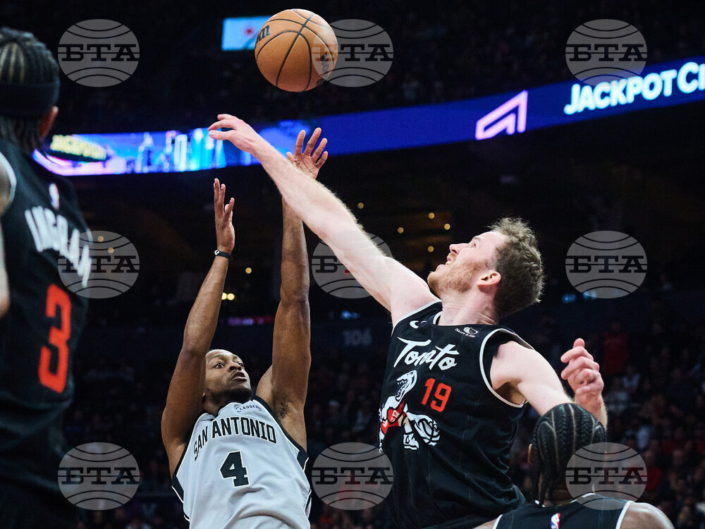 Spurs Raptors Basketball