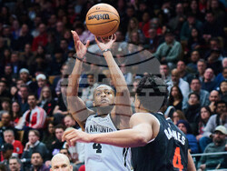 Spurs Raptors Basketball