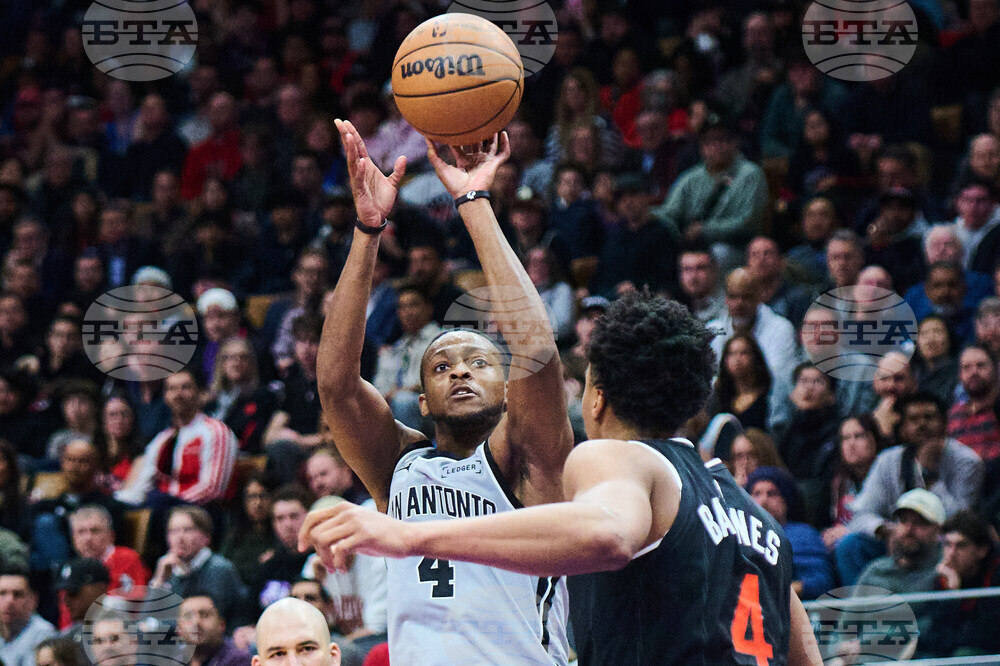 Spurs Raptors Basketball