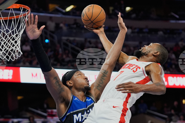 APTOPIX Rockets Magic Basketball