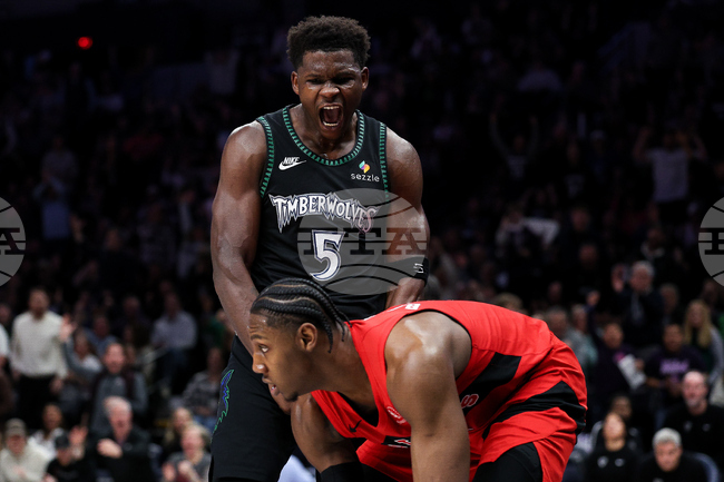 APTOPIX Raptors Timberwolves Basketball