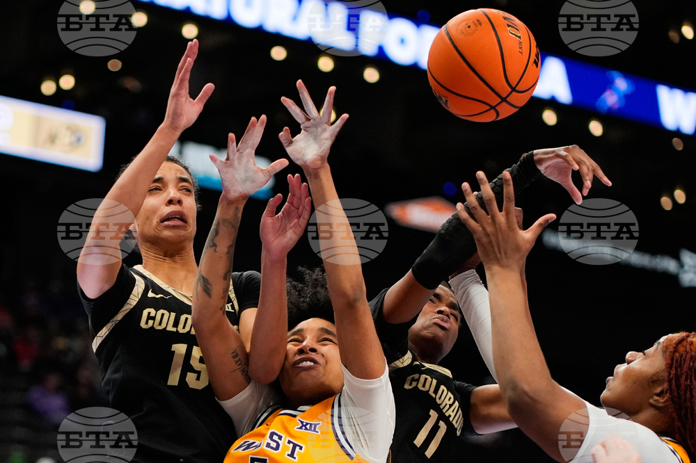 APTOPIX B12 Colorado West Virginia Basketball