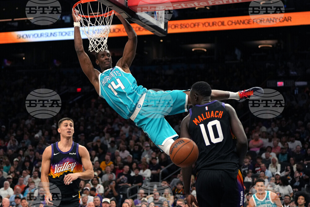 APTOPIX Hornets Suns Basketball