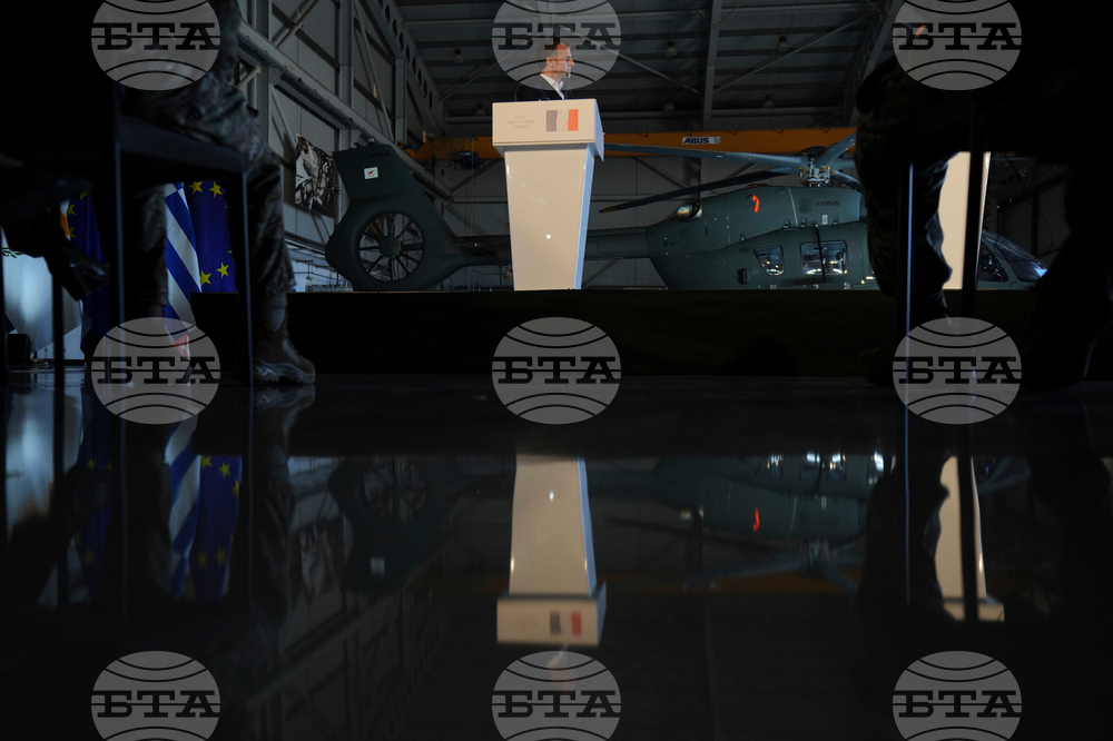 APTOPIX Cyprus Macron Defense