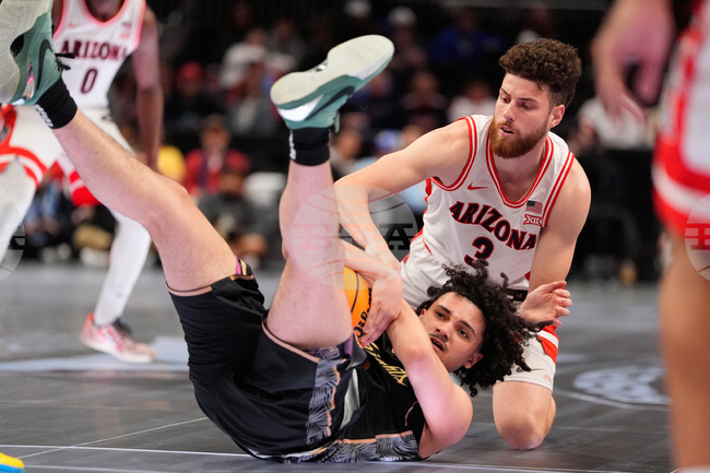 APTOPIX B12 UCF Arizona Basketball