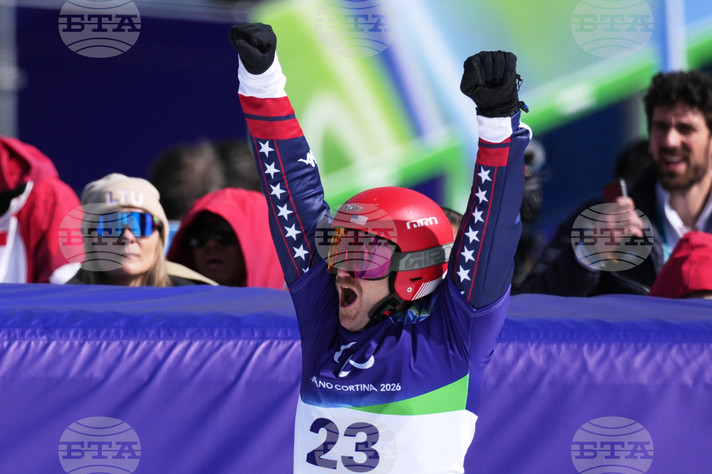 CORRECTION Milan Cortina Paralympics Snowboard