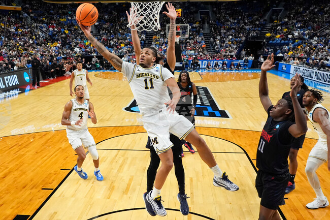 APTOPIX NCAA Howard Michigan Basketball