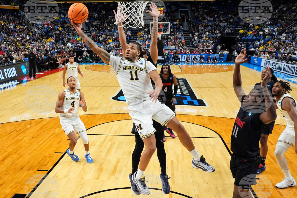 APTOPIX NCAA Howard Michigan Basketball