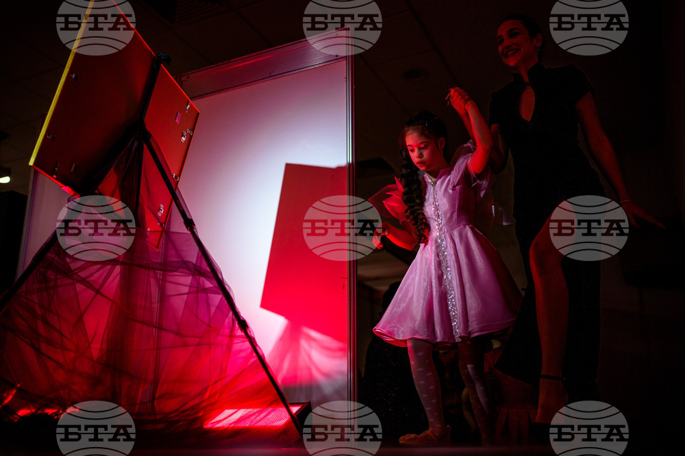 APTOPIX Romania Down Syndrome Catwalk