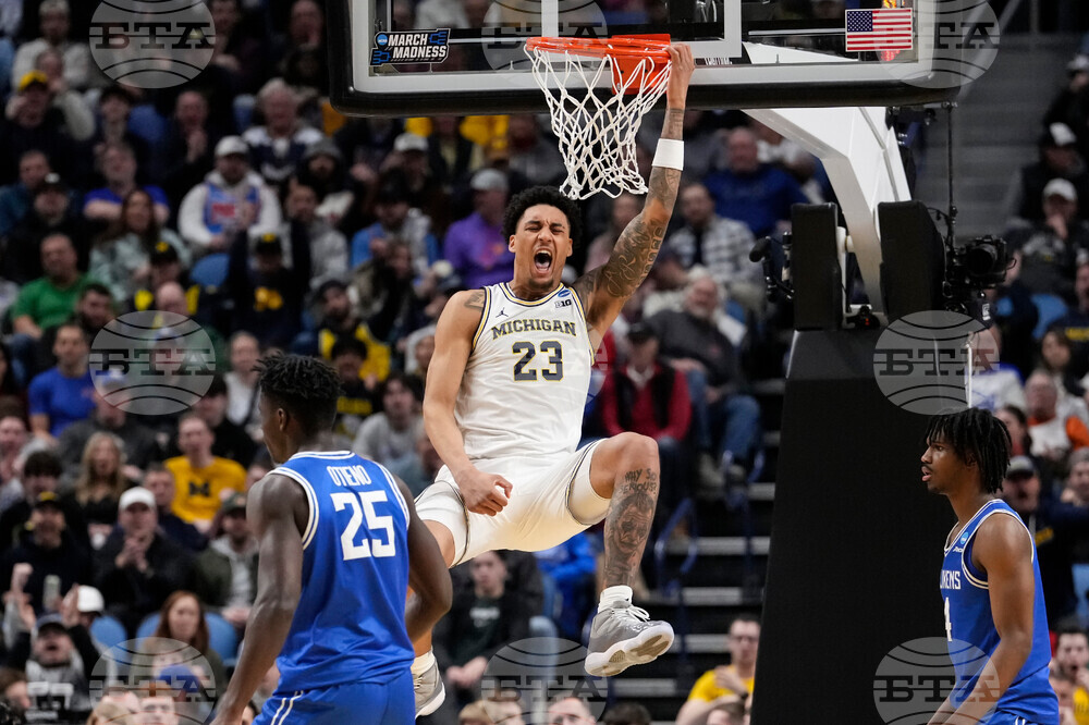 APTOPIX NCAA Saint Louis Michigan Basketball