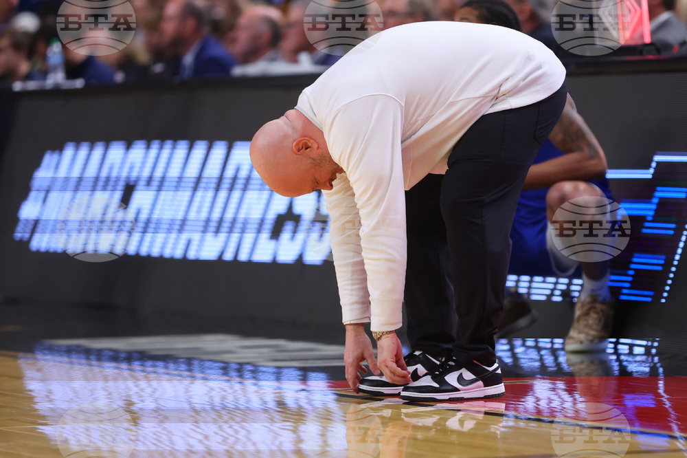 APTOPIX NCAA Saint Louis Michigan Basketball