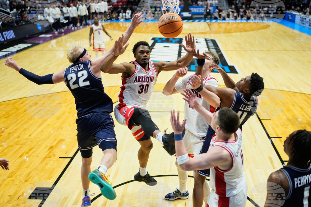 APTOPIX NCAA Utah St Arizona Basketball