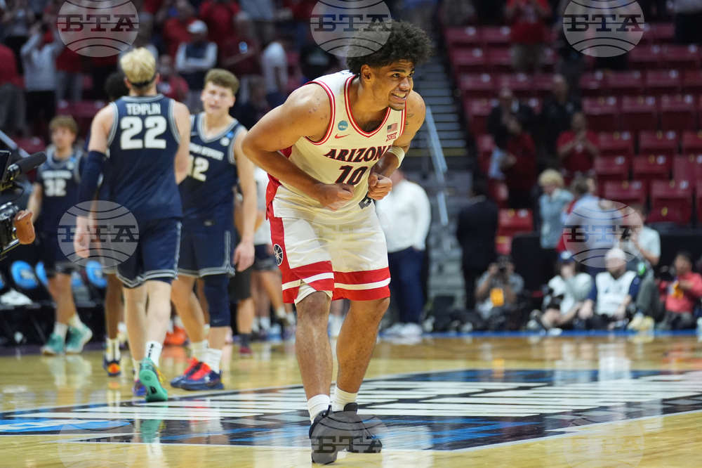 APTOPIX NCAA Utah St Arizona Basketball