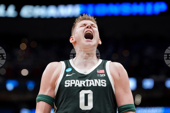 APTOPIX NCAA Michigan St UConn Basketball