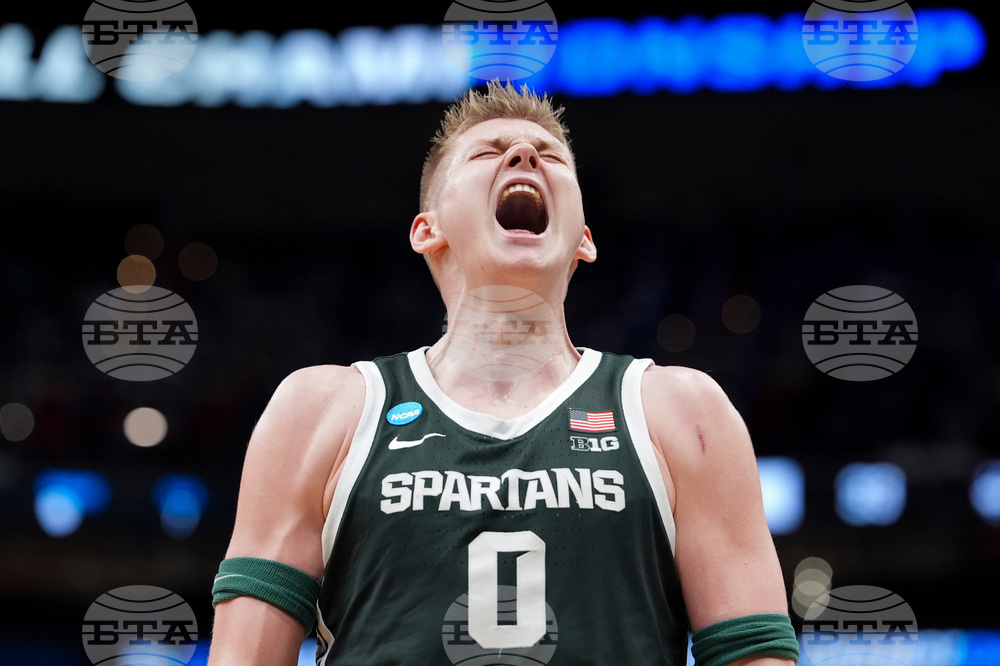 APTOPIX NCAA Michigan St UConn Basketball