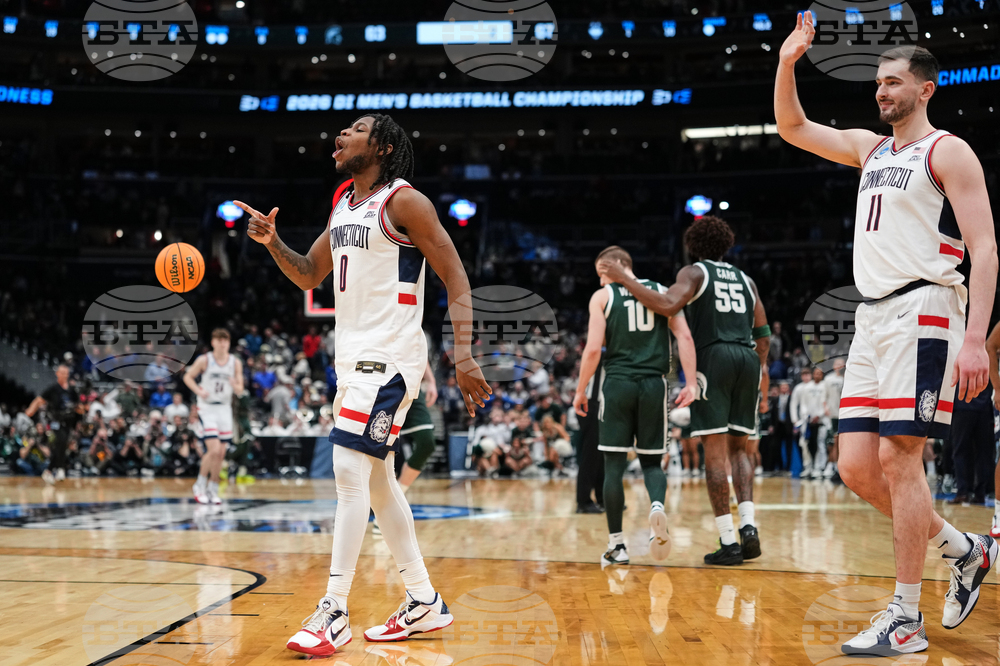 APTOPIX NCAA Michigan St UConn Basketball